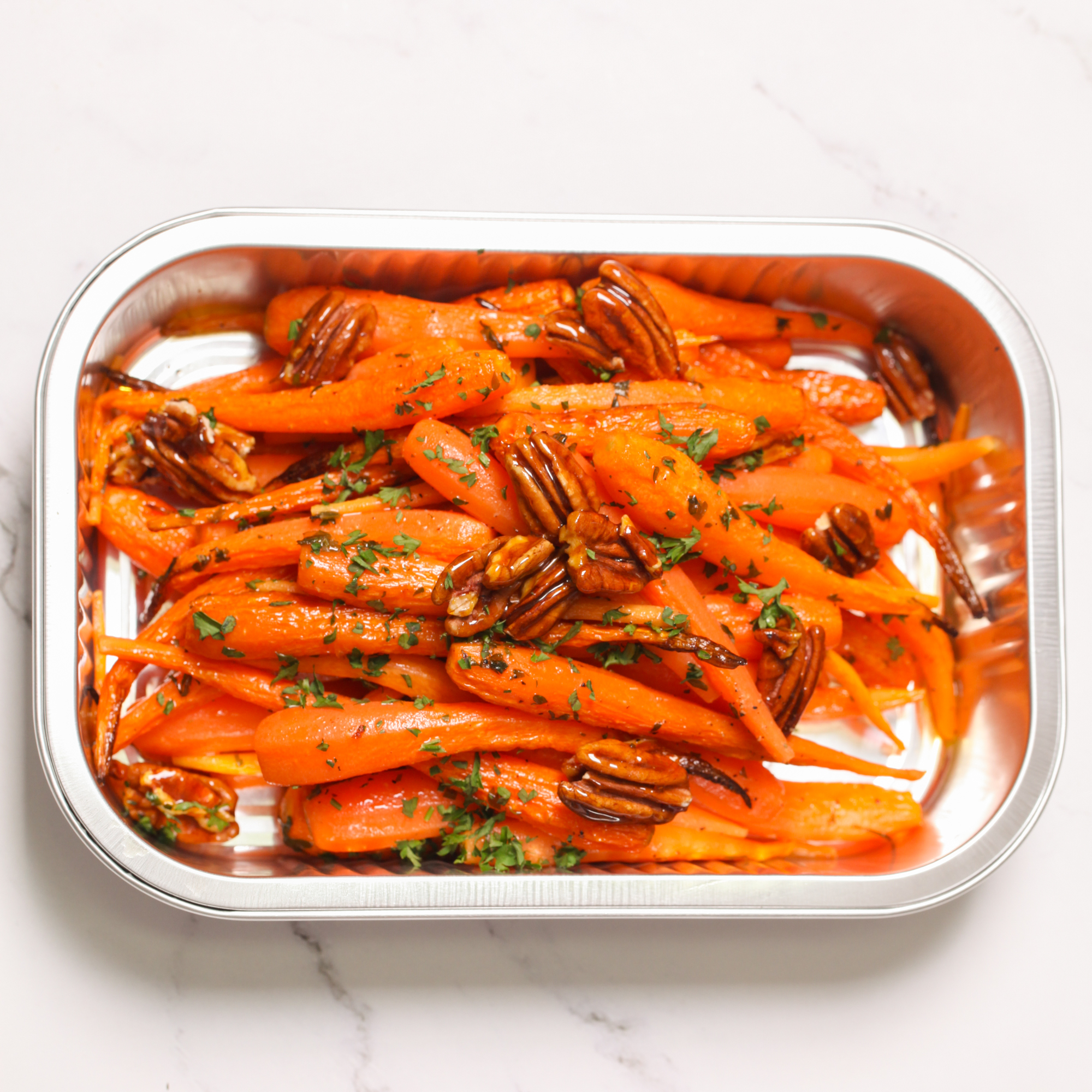 Roast baby carrots with honey butter & pecan